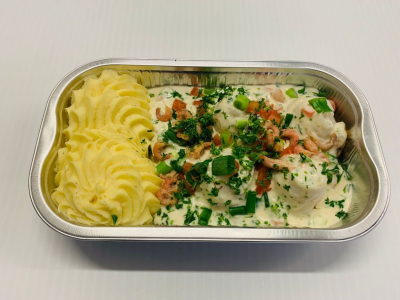 Duo van zalm en tongrol met spinazie op normandische wijze